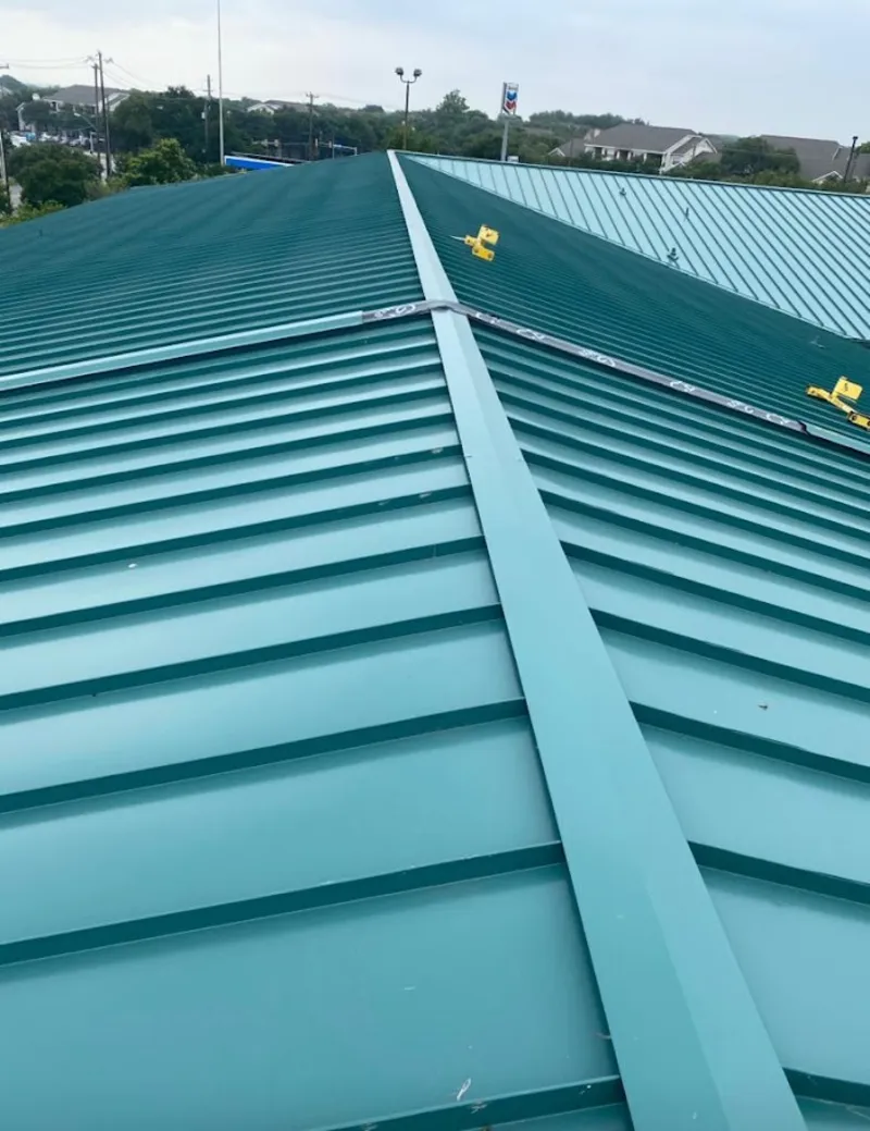 Green commercial metal roof ridge and valley for Metal Roof Repair in Carolina Forest